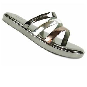Michael Kors Keiko slide metallic.. new no tags. Never worn. Very narrow 36$